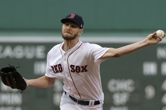 Boston Red Sox's Chris Sale delivers a pitch against the Texas Rangers in the first inning of a baseball game, Wednesday, July 11, 2018, in Boston. (AP Photo/Steven Senne)