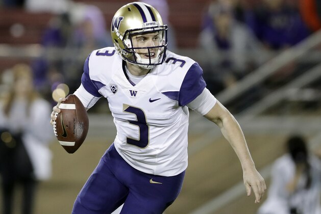 Washington quarterback Jake Browning (3) scrambles against Stanford during the first half of an NCAA college football game Friday, Nov. 10, 2017, in Stanford, Calif. (AP Photo/Marcio Jose Sanchez)