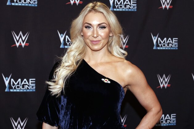 IMAGE DISTRIBUTED FOR WWE - WWE Superstar Charlotte Flair celebrates the Mae Young Classic at the Thomas & Mack Center on Tuesday, Sept. 12, 2017, in Las Vegas. (Bizuayehu Tesfaye/AP Images for WWE)