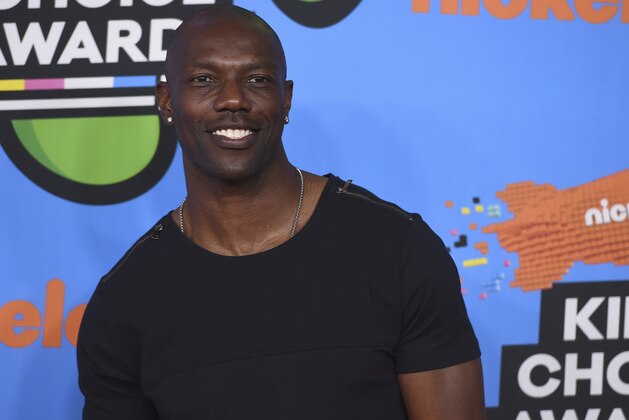 Terrell Owens arrives at the Kids' Choice Awards at The Forum on Saturday, March 24, 2018, in Inglewood, Calif. (Photo by Jordan Strauss/Invision/AP)