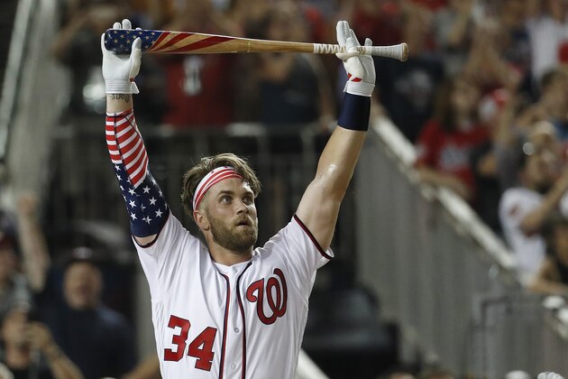Washington Nationals Bryce Harper (34) reacts to his winning hit during the Major League Baseball Home Run Derby, Monday, July 16, 2018 in Washington. (AP Photo/Alex Brandon)
