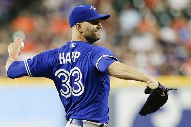 HOUSTON, TX - JUNE 25:  J.A. Happ #33 of the Toronto Blue Jays pitches in the first inning against the Houston Astros at Minute Maid Park on June 25, 2018 in Houston, Texas.  (Photo by Bob Levey/Getty Images)