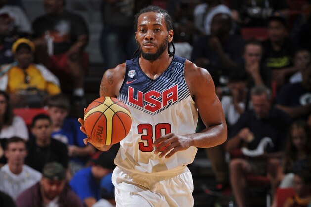 LAS VEGAS, NV - AUGUST 13:  Kawhi Leonard of USA White dribbles the ball against USA Blue during Team USA Basketball Showcase on August 13, 2015 at the Thomas & Mack Center in Las Vegas, Nevada. NOTE TO USER: User expressly acknowledges and agrees that, by downloading and/or using this Photograph, user is consenting to the terms and conditions of the Getty Images License Agreement. Mandatory Copyright Notice: Copyright 2015 NBAE (Photo by Garrett Ellwood/NBAE via Getty Images)