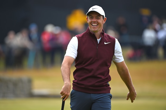 Northern Ireland's Rory McIlroy smiles on the 18th green during a practice round at The 147th Open golf Championship at Carnoustie, Scotland on July 17, 2018. (Photo by Andy BUCHANAN / AFP)        (Photo credit should read ANDY BUCHANAN/AFP/Getty Images)