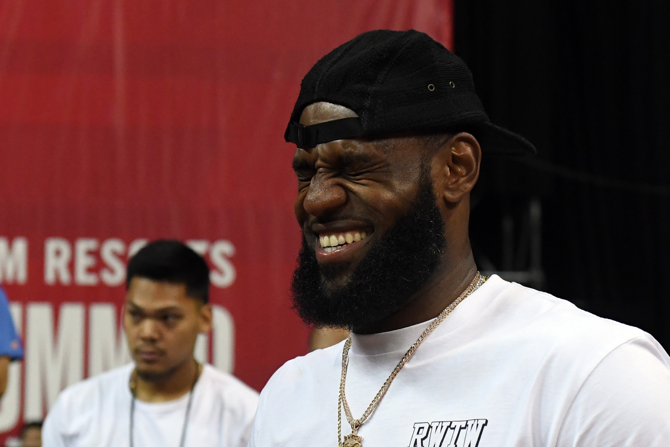 LAS VEGAS, NV - JULY 15:  LeBron James of the Los Angeles Lakers laughs as he attends a quarterfinal game of the 2018 NBA Summer League between the Lakers and the Detroit Pistons at the Thomas & Mack Center on July 15, 2018 in Las Vegas, Nevada. NOTE TO USER: User expressly acknowledges and agrees that, by downloading and or using this photograph, User is consenting to the terms and conditions of the Getty Images License Agreement.  (Photo by Ethan Miller/Getty Images)