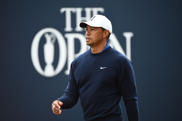 US golfer Tiger Woods walks from the 1st tee during a practice round at The 147th Open golf Championship at Carnoustie, Scotland on July 17, 2018. (Photo by ANDY BUCHANAN / AFP)        (Photo credit should read ANDY BUCHANAN/AFP/Getty Images)