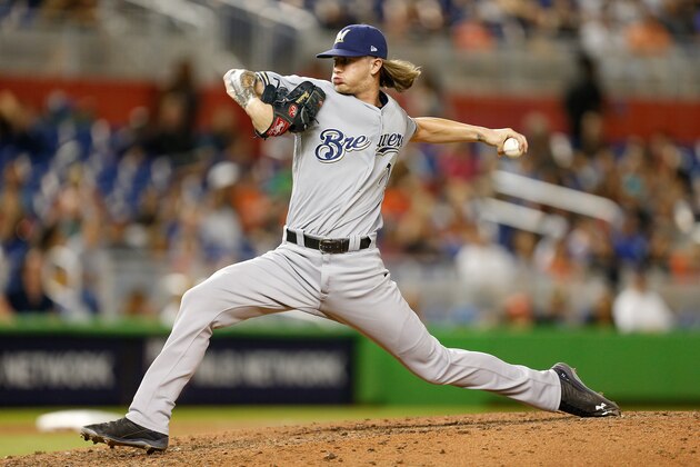 MIAMI, FL - JULY 09:  Josh Hader #71 of the Milwaukee Brewers delivers a pitch in the seventh inning against the Miami Marlins at Marlins Park on July 9, 2018 in Miami, Florida.  (Photo by Michael Reaves/Getty Images)