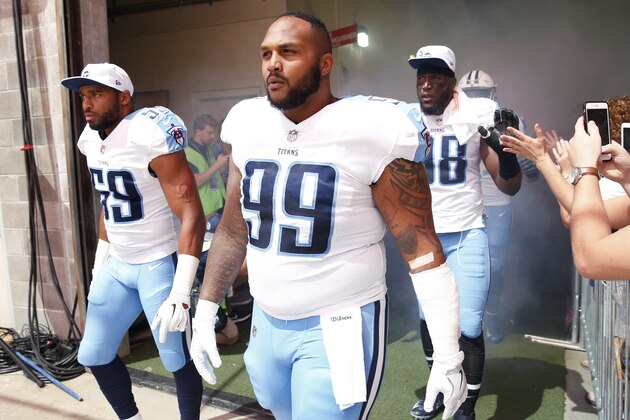 NASHVILLE, TN - AUGUST 27: Jurrell Casey #99, Wesley Woodyard #59 and Brian Orakpo #98 of the Tennessee Titans walk to the field prior to a preseason game against the Chicago Bears at Nissan Stadium on August 27, 2017 in Nashville, Tennessee. (Photo by Joe Robbins/Getty Images)