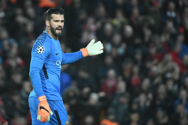 Roma's Brazilian goalkeeper Alisson gestures during the UEFA Champions League first leg semi-final football match between Liverpool and Roma at Anfield stadium in Liverpool, north west England on April 24, 2018. (Photo by Filippo MONTEFORTE / AFP)        (Photo credit should read FILIPPO MONTEFORTE/AFP/Getty Images)