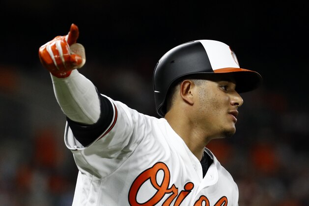 Baltimore Orioles' Manny Machado gestures as he rounds the bases on his two-run home run in the seventh inning of a baseball game against the New York Yankees, Tuesday, July 10, 2018, in Baltimore. (AP Photo/Patrick Semansky)