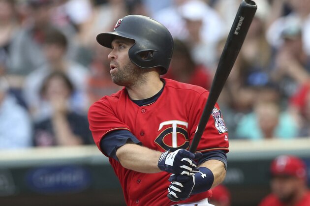 Minnesota Twins' Brian Dozier bats against the Baltimore Orioles in a baseball game Friday, July 6, 2018, in Minneapolis. (AP Photo/Jim Mone)