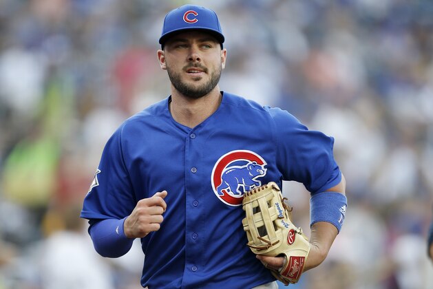 Chicago Cubs third baseman Kris Bryant runs into the clubhouse after warm ups before a baseball game aSan Diego Padres in San Diego, Saturday, July 14, 2018. (AP Photo/Alex Gallardo)