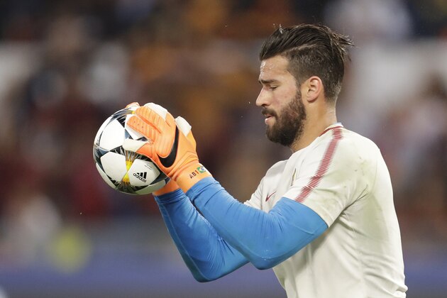 Roma goalkeeper Alisson Becker catches the ball during the warm-up ahead of the Champions League semifinal second leg soccer match between Roma and Liverpool at the Olympic Stadium in Rome, Wednesday, May 2, 2018. (AP Photo/Andrew Medichini)