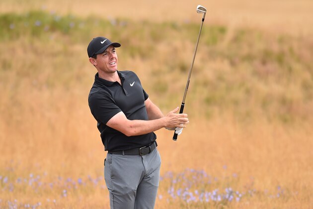 Northern Ireland's Rory McIlroy plays out of the rough on the 6th hole during his first round on day one of The 147th Open golf Championship at Carnoustie, Scotland on July 19, 2018. (Photo by Glyn KIRK / AFP)        (Photo credit should read GLYN KIRK/AFP/Getty Images)