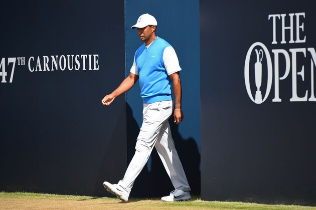 US golfer Tiger Woods walks onto the 1st tee for his first round on day one of The 147th Open golf Championship at Carnoustie, Scotland on July 19, 2018. (Photo by Andy BUCHANAN / AFP)        (Photo credit should read ANDY BUCHANAN/AFP/Getty Images)