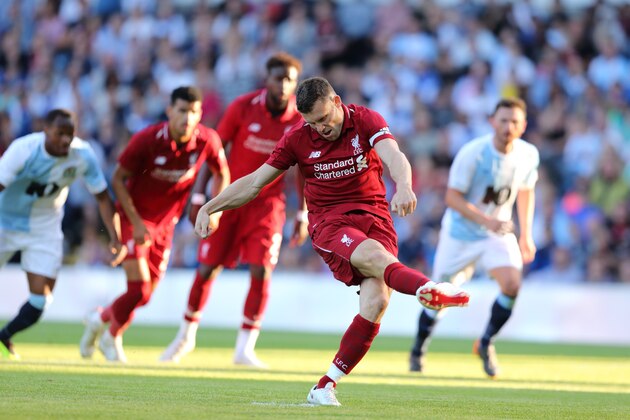 BLACKBURN, ENGLAND - JULY 19: James Milner of Liverpool misses from the penalty spot at Ewood Park on July 19, 2018 in Blackburn, England. (Photo by James Williamson - AMA/Getty Images)