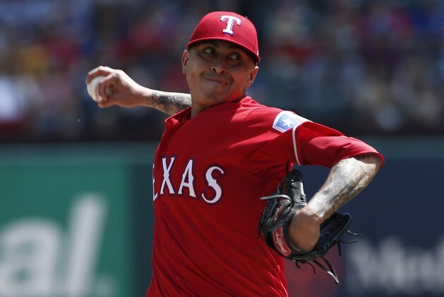 Texas Rangers pitcher Jesse Chavez delivers against the Detroit Tigers during a baseball game Wednesday, May 9, 2018, in Arlington, Texas. (AP Photo/Mike Stone)