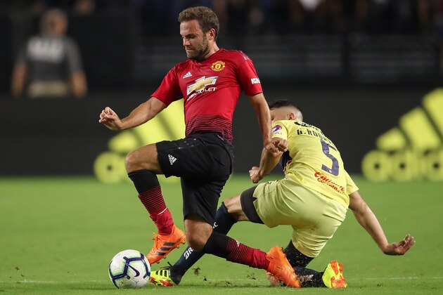 GLENDALE, AZ - JULY 19:  Juan Mata #8 of Manchester United and Guido Rodriguez #5 of Club America in action during the International Champions Cup game at the University of Phoenix Stadium on July 19, 2018 in Glendale, Arizona.  (Photo by Christian Petersen/Getty Images for International Champions Cup)