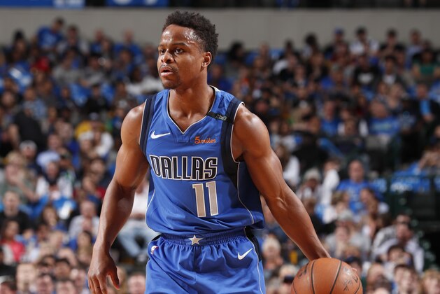 DALLAS, TX - APRIL 10:  Yogi Ferrell #11 of the Dallas Mavericks handles the ball during the game against the Phoenix Suns on April 10, 2018 at the American Airlines Center in Dallas, Texas. NOTE TO USER: User expressly acknowledges and agrees that, by downloading and or using this photograph, User is consenting to the terms and conditions of the Getty Images License Agreement. Mandatory Copyright Notice: Copyright 2018 NBAE (Photo by Danny Bollinger/NBAE via Getty Images)