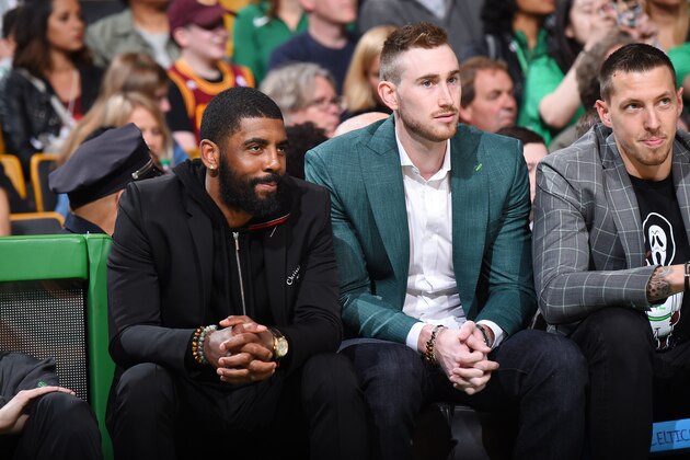 BOSTON, MA - MAY 13:  Kyrie Irving #11 Gordon Hayward #20 and Daniel Theis #27 of the Boston Celtics look on during Game One of the Eastern Conference Finals of the 2018 NBA Playoffs against the Cleveland Cavaliers on May 13, 2018 at the TD Garden in Boston, Massachusetts.  NOTE TO USER: User expressly acknowledges and agrees that, by downloading and or using this photograph, User is consenting to the terms and conditions of the Getty Images License Agreement. Mandatory Copyright Notice: Copyright 2018 NBAE  (Photo by Brian Babineau/NBAE via Getty Images)