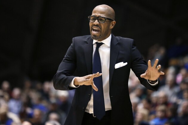 Penn head coach Jerome Allen shouts instructions to his players during the second half of an NCAA college basketball game against Princeton on Saturday, Jan. 10, 2015, in Princeton, N.J. Princeton won 78-74. (AP Photo/Mel Evans)