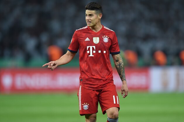 Bayern Munich's Colombian James Rodriguez gestures during the German Cup DFB Pokal final football match FC Bayern Munich vs Eintracht Frankfurt at the Olympic Stadium in Berlin on May 19, 2018. (Photo by Christof STACHE / AFP) / RESTRICTIONS: ACCORDING TO DFB RULES IMAGE SEQUENCES TO SIMULATE VIDEO IS NOT ALLOWED DURING MATCH TIME. MOBILE (MMS) USE IS NOT ALLOWED DURING AND FOR FURTHER TWO HOURS AFTER THE MATCH. == RESTRICTED TO EDITORIAL USE == FOR MORE INFORMATION CONTACT DFB DIRECTLY AT +49 69 67880 /         (Photo credit should read CHRISTOF STACHE/AFP/Getty Images)