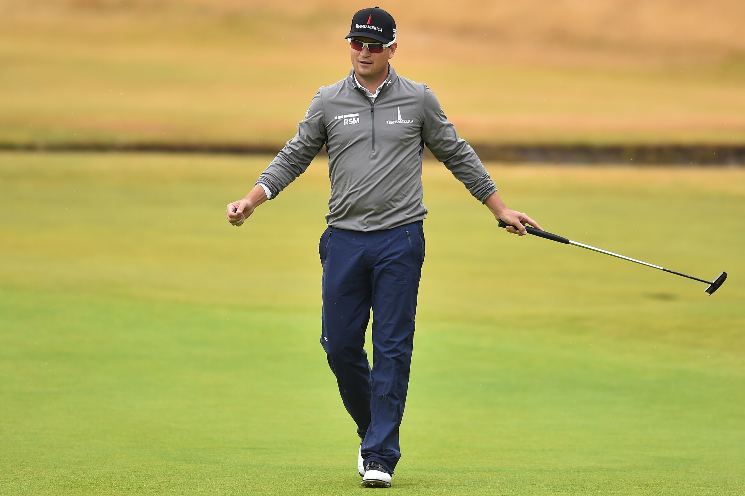 US golfer Zach Johnson reacts after making a birdie putt on the 18th green during his second round 67 on day 2 of The 147th Open golf Championship at Carnoustie, Scotland on July 20, 2018. (Photo by Glyn KIRK / AFP) (Photo credit should read GLYN KIRK/AFP/Getty Images) US golfer Zach Johnson reacts after making a birdie putt on the 18th green during his second round 67 on day 2 of The 147th Open golf Championship at Carnoustie, Scotland on July 20, 2018. (Photo by Glyn KIRK / AFP) (Photo credit should read GLYN KIRK/AFP/Getty Images)