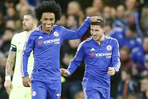 Chelsea's Willian, left, and teammate Eden Hazard celebrate after scoring during the English FA Cup soccer match between Chelsea and Manchester City at the Stamford Bridge stadium in London, Sunday, Feb. 21, 2016.(AP Photo/Frank Augstein)