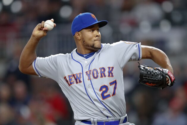 New York Mets relief pitcher Jeurys Familia works in the 12th inning of a baseball game against the Atlanta Braves on Friday, April 20, 2018, in Atlanta. New York won 5-3 in 12 innings. (AP Photo/John Bazemore)