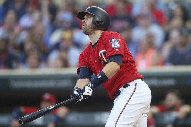 Minnesota Twins' Brian Dozier bats against the Tampa Bay Rays in the first inning of a baseball game Friday, July 13, 2018, in Minneapolis. (AP Photo/Jim Mone)