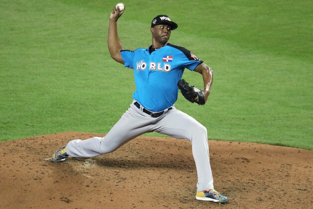 MIAMI, FL - JULY 09:  Domingo Acevedo #46 of the New York Yankees and the World Team delivers the pitch against the U.S. Team during the SiriusXM All-Star Futures Game at Marlins Park on July 9, 2017 in Miami, Florida.  (Photo by Rob Carr/Getty Images)