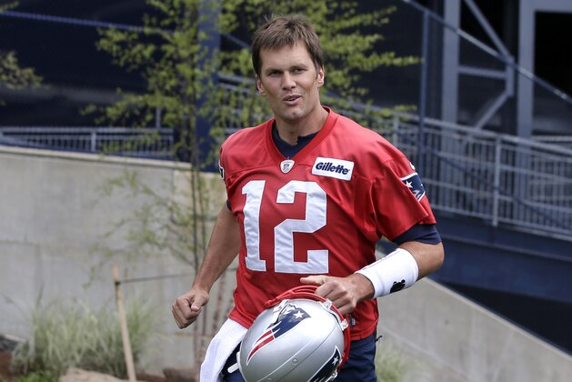 New England Patriots quarterback Tom Brady steps onto the field at the start of an NFL football minicamp practice, Tuesday, June 5, 2018, in Foxborough, Mass. (AP Photo/Steven Senne)
