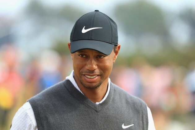 CARNOUSTIE, SCOTLAND - JULY 21:  Tiger Woods of the United States smiles on the ninth hole during the third round of the 147th Open Championship at Carnoustie Golf Club on July 21, 2018 in Carnoustie, Scotland.  (Photo by Andrew Redington/Getty Images)