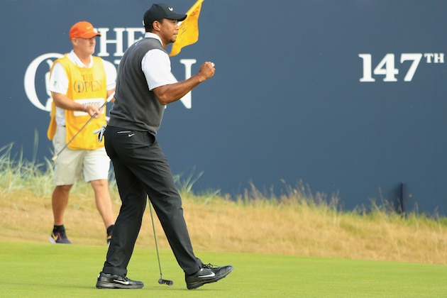 CARNOUSTIE, SCOTLAND - JULY 21:  Tiger Woods of the United States reacts to his par putt on the 18th green during the third round of the 147th Open Championship at Carnoustie Golf Club on July 21, 2018 in Carnoustie, Scotland.  (Photo by Andrew Redington/Getty Images)