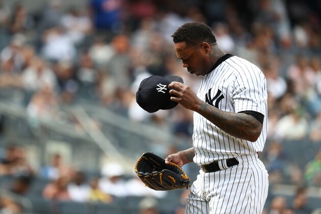 NEW YORK, NY - JULY 21:  Aroldis Chapman #54 of the New York Yankees leaves the game after walking in two runs in the ninth inning against the New York Mets during their game at Yankee Stadium on July 21, 2018 in New York City.  (Photo by Al Bello/Getty Images)