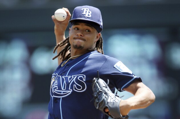 Tampa Bay Rays pitcher Chris Archer throws against the Minnesota Twins in the first inning of a baseball game Saturday, July 14, 2018, in Minneapolis. (AP Photo/Jim Mone)
