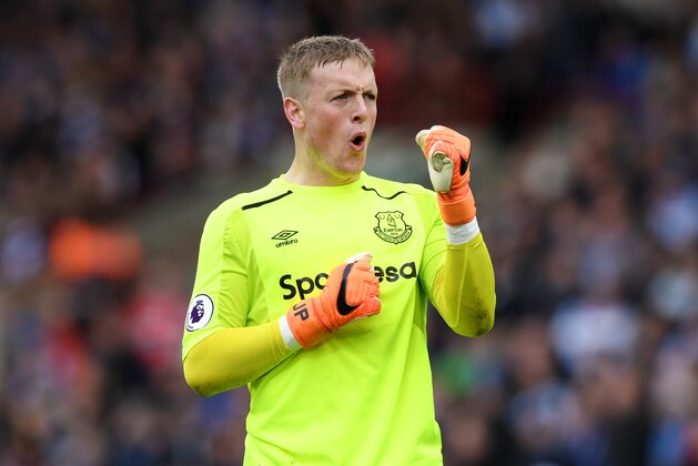 HUDDERSFIELD, ENGLAND - APRIL 28:  Jordan Pickford of Everton celebrates after his sides first goal during the Premier League match between Huddersfield Town and Everton at John Smith's Stadium on April 28, 2018 in Huddersfield, England.  (Photo by Shaun Botterill/Getty Images)