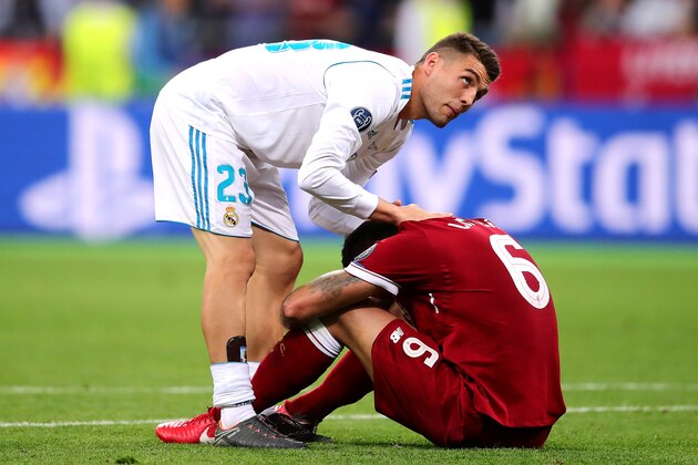 KIEV, UKRAINE - MAY 26: Dejan Lovren of Liverpool is consoled by Mateo Kovacevic of Real Madrid following the UEFA Champions League final between Real Madrid and Liverpool at the NSC Olimpiyskiy on May 26, 2018 in Kiev, Ukraine. (Photo by Chris Brunskill Ltd/Getty Images)