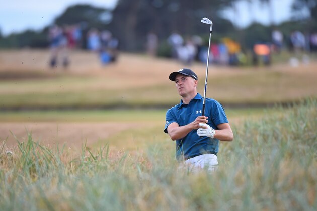 US golfer Jordan Spieth watches his shot played from the rough on the 18th hole during his third round on day 3 of The 147th Open golf Championship at Carnoustie, Scotland on July 21, 2018. (Photo by Andy BUCHANAN / AFP)        (Photo credit should read ANDY BUCHANAN/AFP/Getty Images)
