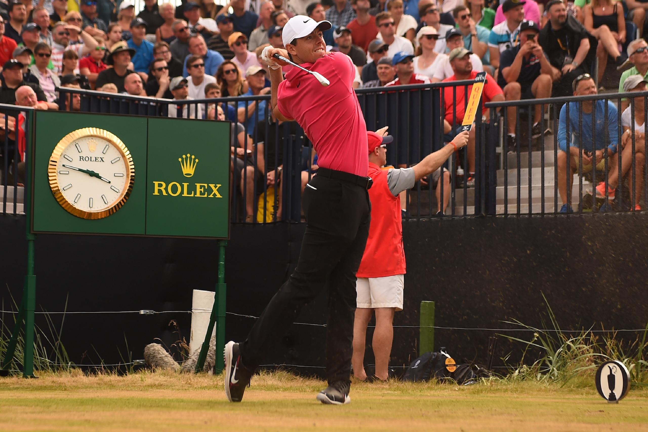 Northern Ireland's Rory McIlroy watches his iron shot on the 8th tee during his final round on day 4 of The 147th Open golf Championship at Carnoustie, Scotland on July 22, 2018. (Photo by Andy BUCHANAN / AFP)        (Photo credit should read ANDY BUCHANAN/AFP/Getty Images)