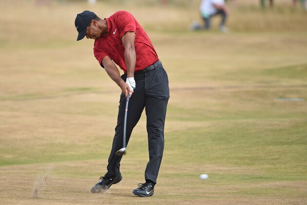 US golfer Tiger Woods plays his approach from the 6th fairway during his final round on day 4 of The 147th Open golf Championship at Carnoustie, Scotland on July 22, 2018. (Photo by Paul ELLIS / AFP)        (Photo credit should read PAUL ELLIS/AFP/Getty Images)