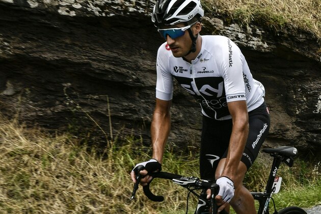 Great Britain's Team Sky cycling team rider, Italy's Gianni Moscon rides during the 15th stage of the 105th edition of the Tour de France cycling race, between Millau and Carcassonne on July 22, 2018. - Italian Gianni Moscon, a Team Sky teammate of defending Tour de France champion Chris Froome, was thrown off the race on July 22 after an altercation with a fellow racer, officials said. Race officials took the decision after Moscon was involved in a fracas with a rider from the Fortuneo team shortly after the stage start in Millau. (Photo by Philippe LOPEZ / AFP) / ALTERNATIVE CROP        (Photo credit should read PHILIPPE LOPEZ/AFP/Getty Images)