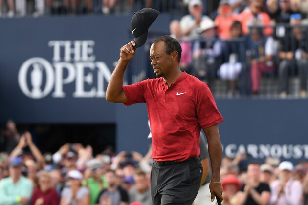 CARNOUSTIE, SCOTLAND - JULY 22:  Tiger Woods of the United States acknowledges the crowd on the 18th green during the final round of the 147th Open Championship at Carnoustie Golf Club on July 22, 2018 in Carnoustie, Scotland.  (Photo by Harry How/Getty Images)