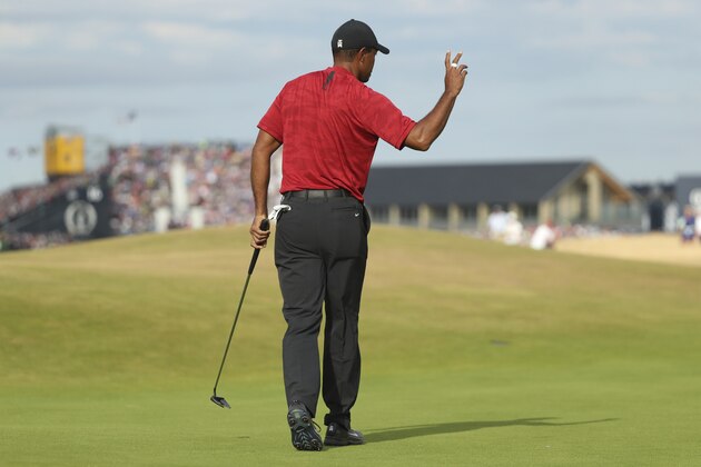 Tiger Woods of the US plays a shot to the 18th green during the final round for the 147th British Open Golf championships in Carnoustie, Scotland, Sunday, July 22, 2018. (AP Photo/Peter Morrison)