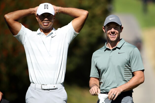 PACIFIC PALISADES, CA - FEBRUARY 16:  Tiger Woods and Rory McIlroy of Northern Ireland meet at the fourth tee during the second round of the Genesis Open at Riviera Country Club on February 16, 2018 in Pacific Palisades, California. (Photo by Christian Petersen/Getty Images)