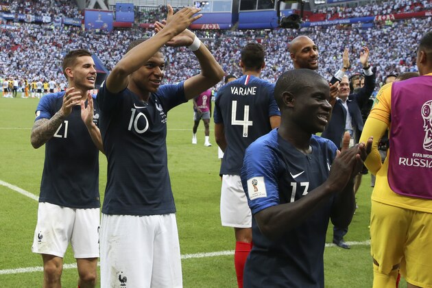 KAZAN, RUSSIA - JUNE 30: Lucas Hernandez, Kylian Mbappe, N'Golo Kante and teammates of France celebrate the victory following the 2018 FIFA World Cup Russia Round of 16 match between France and Argentina at Kazan Arena on June 30, 2018 in Kazan, Russia. (Photo by Jean Catuffe/Getty Images)