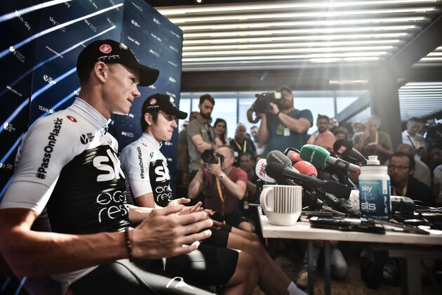 TOPSHOT - Great Britain's Team Sky cycling team riders, Great Britain's Christopher Froome (L) and the race's overall leader, Great Britain's Geraint Thomas (2ndL) address the media during a press conference on July 23, 2018 in Carcassonne, southwestern France, on the second rest day of the 105th edition of the Tour de France cycling race. (Photo by Marco BERTORELLO / AFP)        (Photo credit should read MARCO BERTORELLO/AFP/Getty Images)