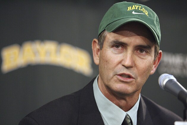 FILE - In this Nov. 28, 2007, file photo, Art Briles answers questions after being introduced as the new coach of the Baylor University football team during a press conference in Waco, Texas. Baylor University has explained for the first time how Briles, the school's former football coach and others responded to a woman's claims that she was gang-raped by five players. University officials told The Dallas Morning News on Friday, Nov. 11, 2016, that the student-athlete informed her coach in April 2013 that she had been assaulted a year earlier and provided the names of the players.  The university contends the coach reported the matter to Briles, ex-athletic director Ian McCaw and a sports administrator.  (AP Photo/Duane A. Laverty, File
