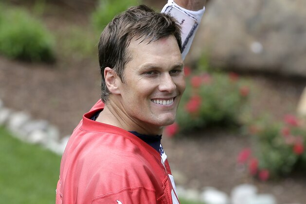 New England Patriots quarterback Tom Brady waves as he steps off the field following an NFL football minicamp practice, Thursday, June 7, 2018, in Foxborough, Mass. (AP Photo/Steven Senne)