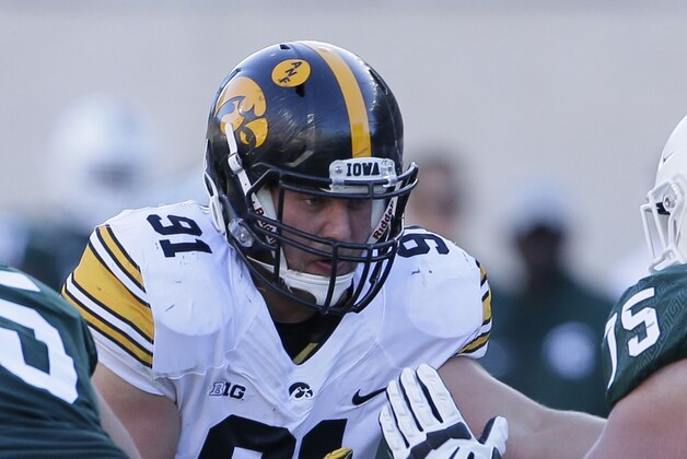 EAST LANSING, MI - SEPTEMBER 30:  Defensive lineman Brady Reiff #91 of the Iowa Hawkeyes goes up against offensive lineman Brian Allen #65 of the Michigan State Spartans and guard Kevin Jarvis #75 of the Michigan State Spartans during the first half at Spartan Stadium on September 30, 2017 in East Lansing, Michigan. (Photo by Duane Burleson/Getty Images)
